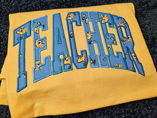 Teacher-Woodstock-Applique T-Shirt